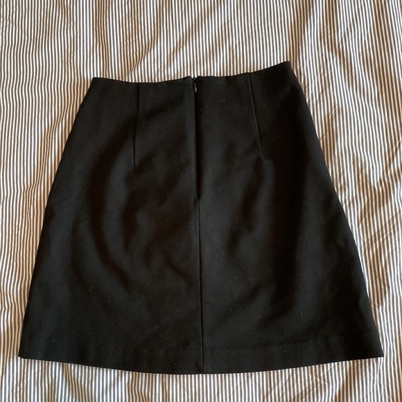 Mini skirt with gold details - Picture 3 of 3